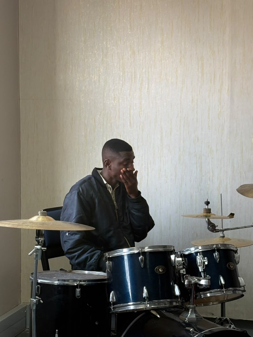 A drummer leading praise and worship